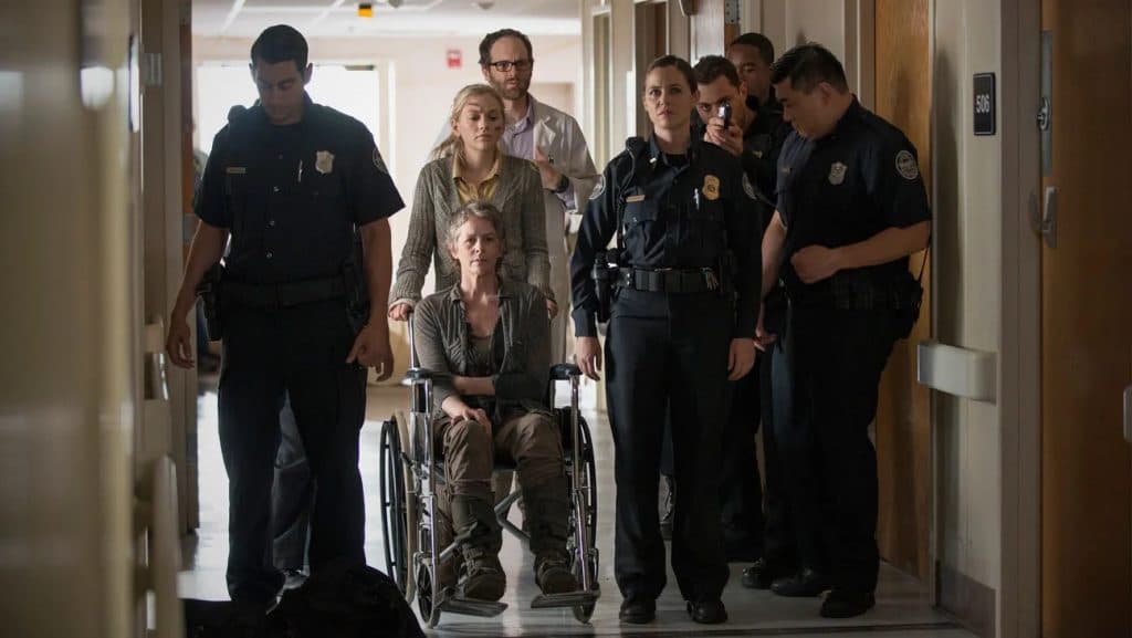 The Walking Dead: Beth walks through the hospital pushing Carol in a wheelchair