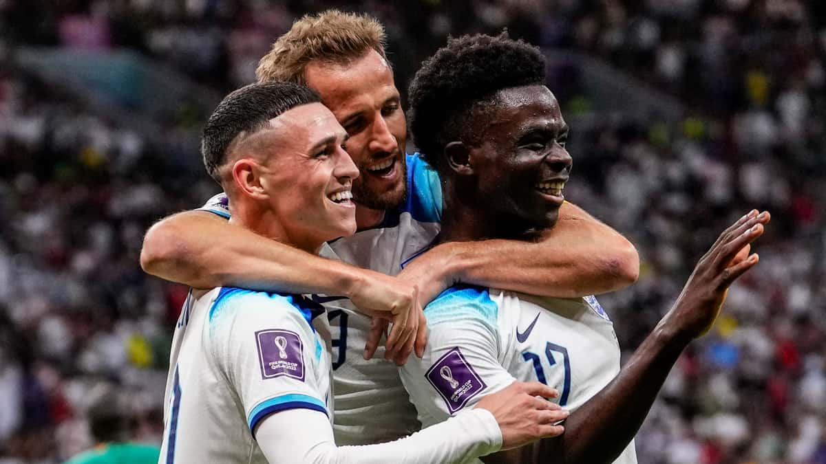 Phil Foden, Harry Kane and Bukayo Saka celebrate for England