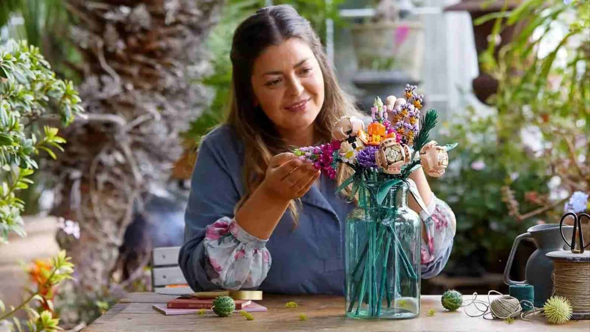 An adult with their LEGO Flower Bouquet