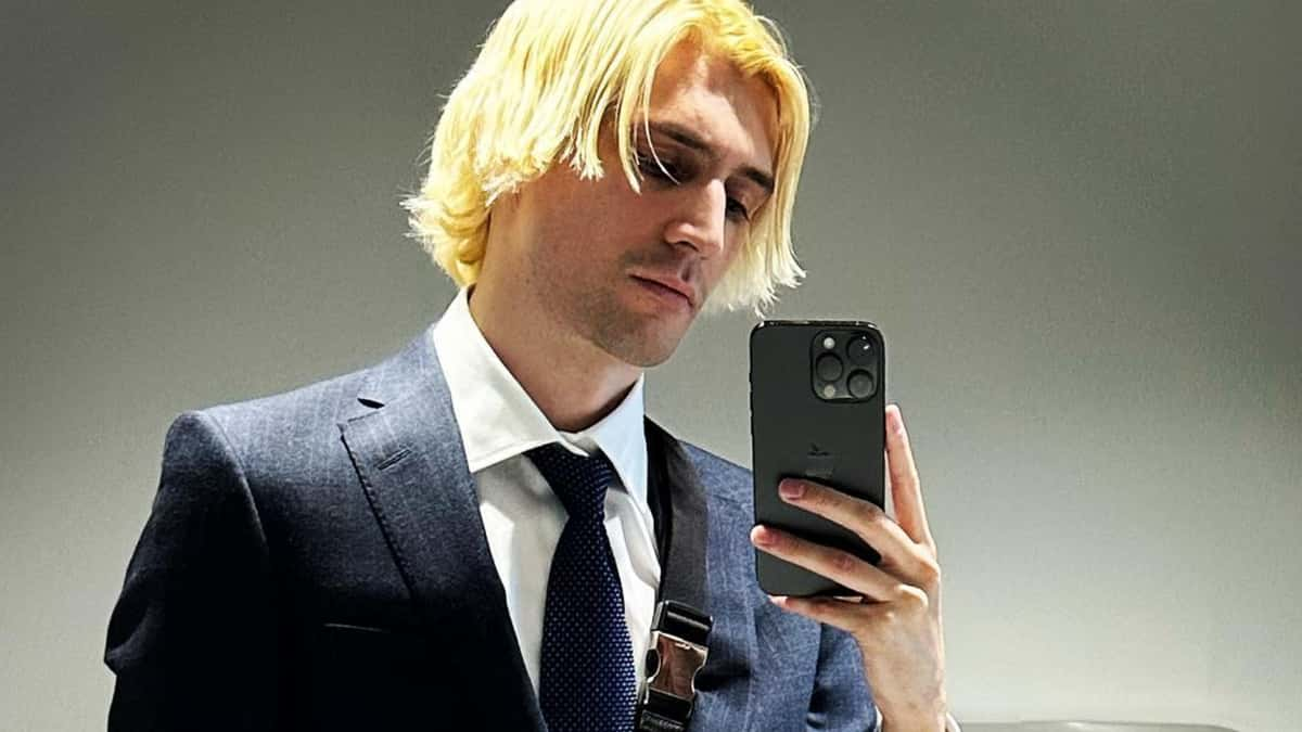 xqc dressed up fancy in suit