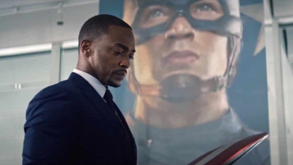 Sam Wilson looks at Steve Rogers' shield