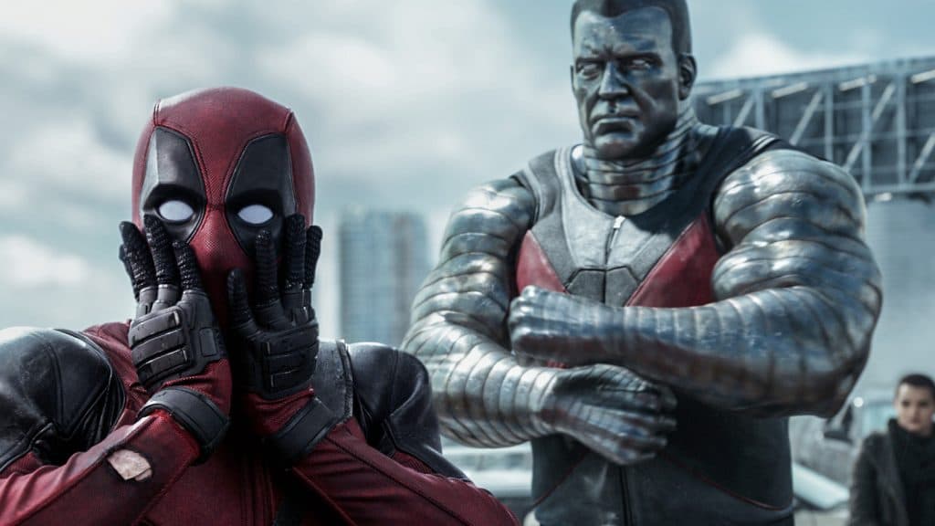 Deadpool looks shocked while Colossus looks disapproving.