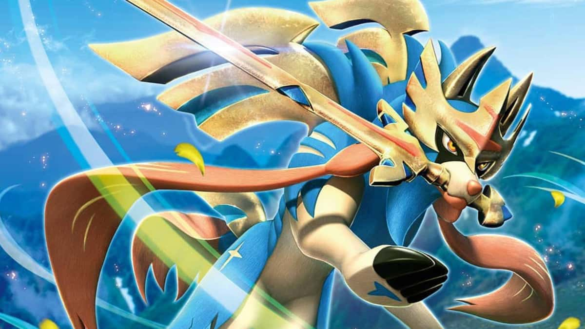 The Pokemon Zacian attacks with a sword in Pokemon TCG key art