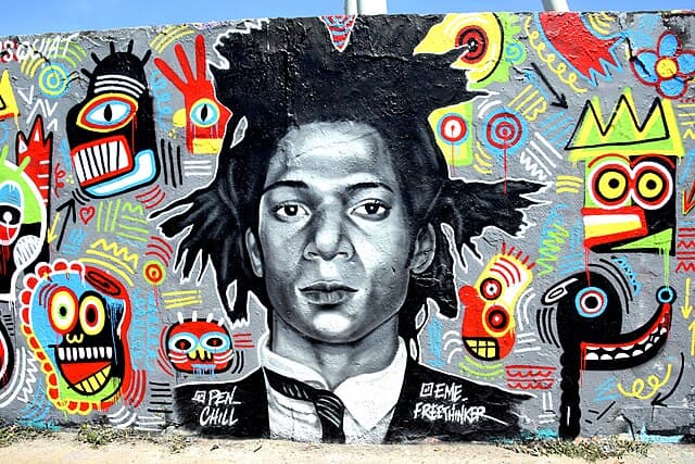 Graffiti Jean-Michel Basquiat by Eme Freethinker/Pen_Chill in Mauerpark in Berlin-Prenzlauer Berg, Germany.
