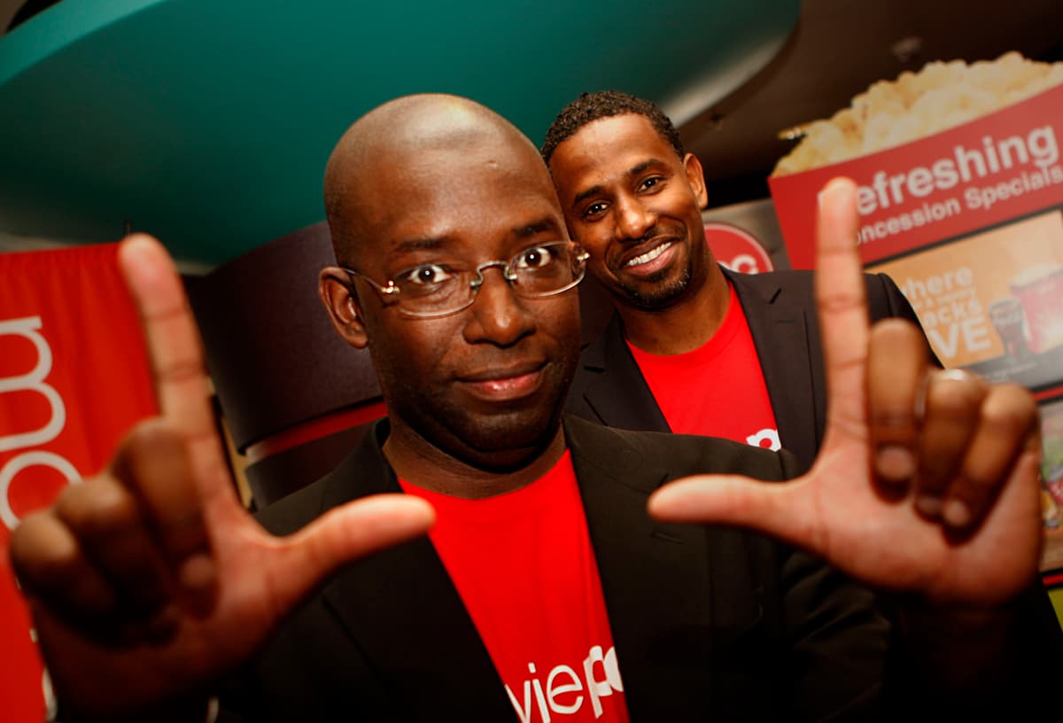 MoviePass co-founders Stacy Spikes (front) and Hamet Watt (back) at AMC in San Francisco, California.