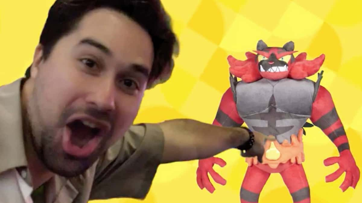 Pokemon VG Champion Wolfe Glick points at an Incineroar