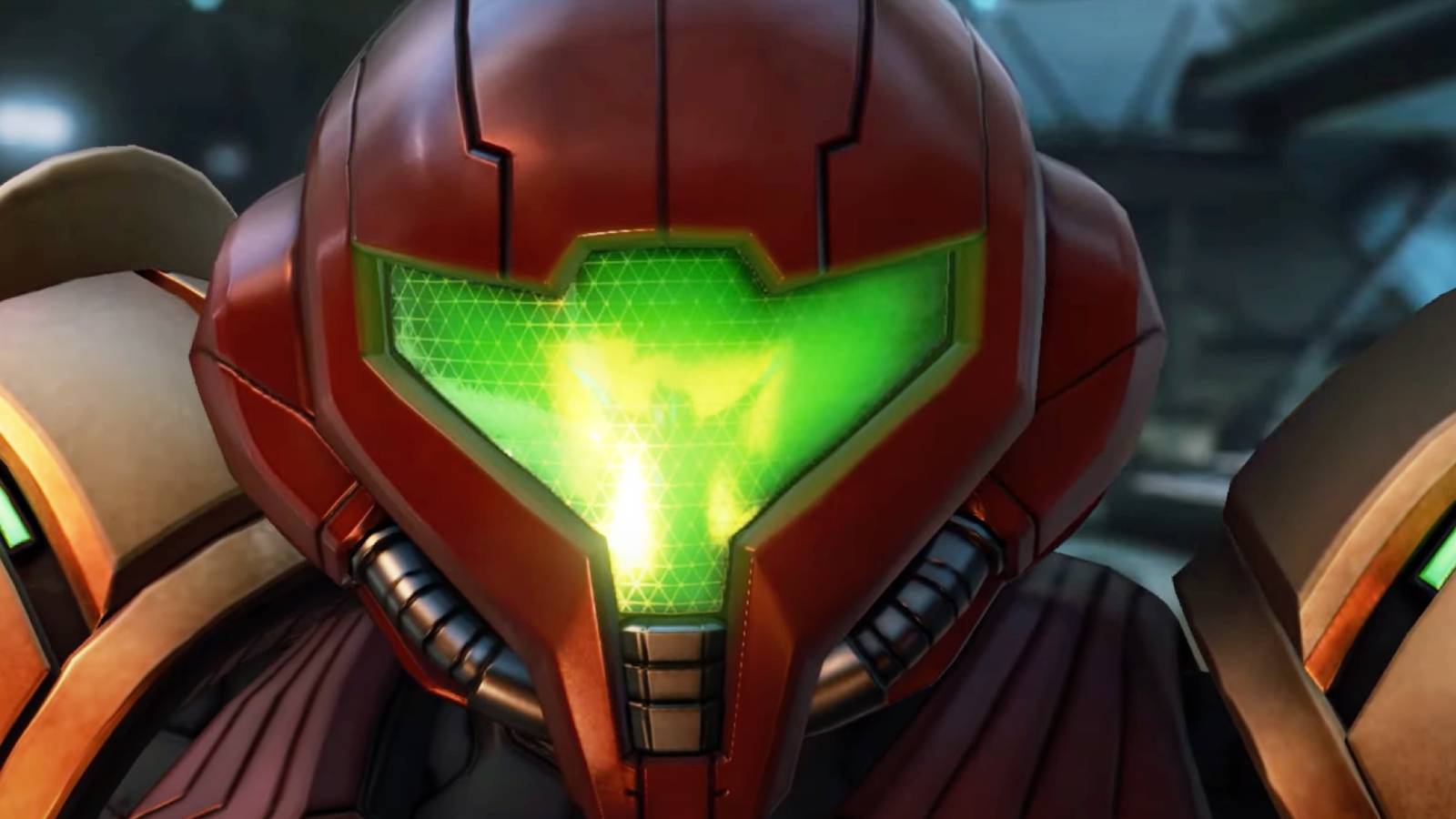 A screenshot from the Metroid Prime 4 trailer shows a close up of Samus Aran looking towards the camera