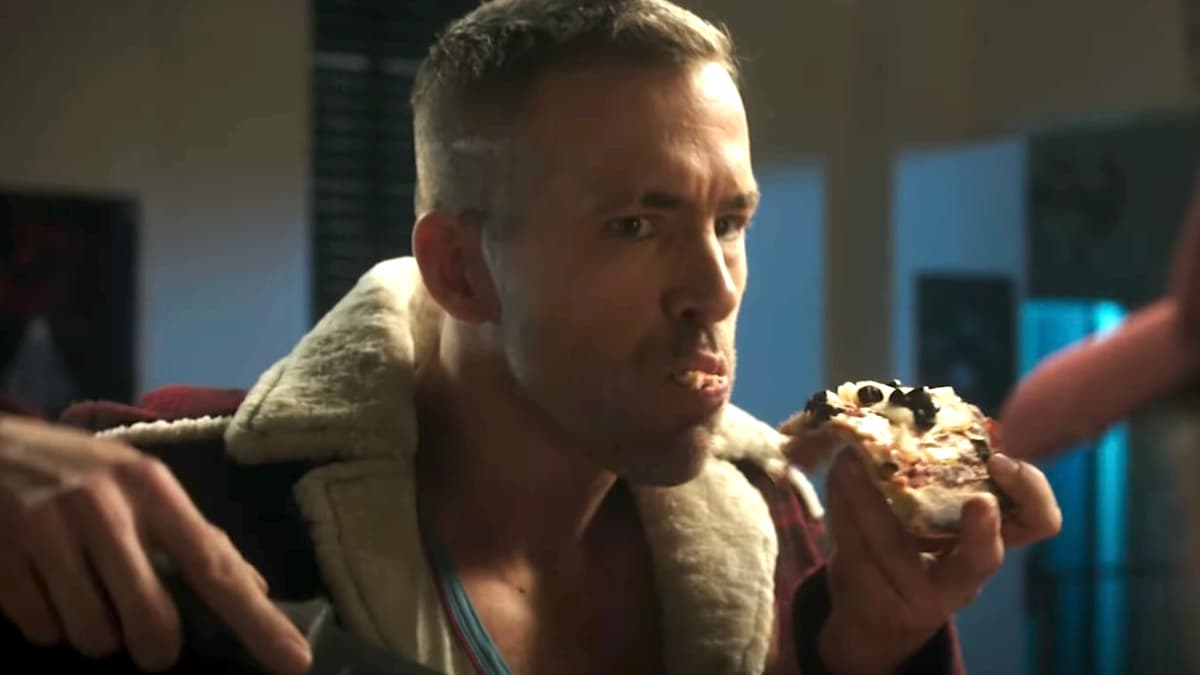 Wade Wilson eating pizza in Deadpool