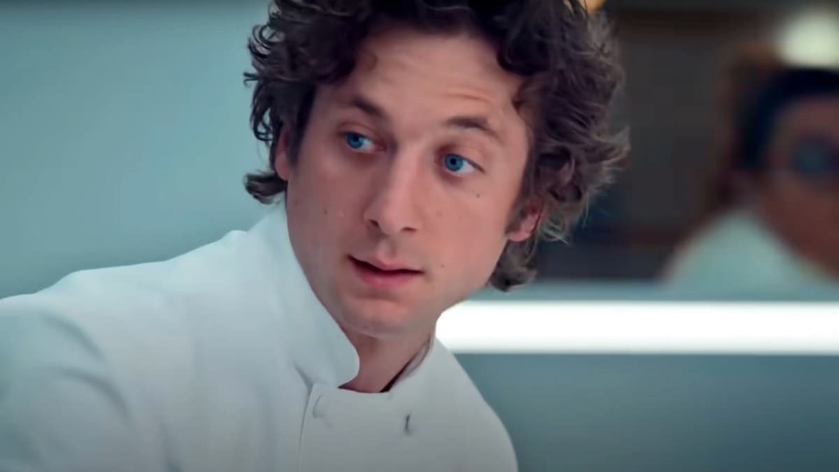 Jeremy Allen White as Carmy in The Bear, wearing a white chef's uniform