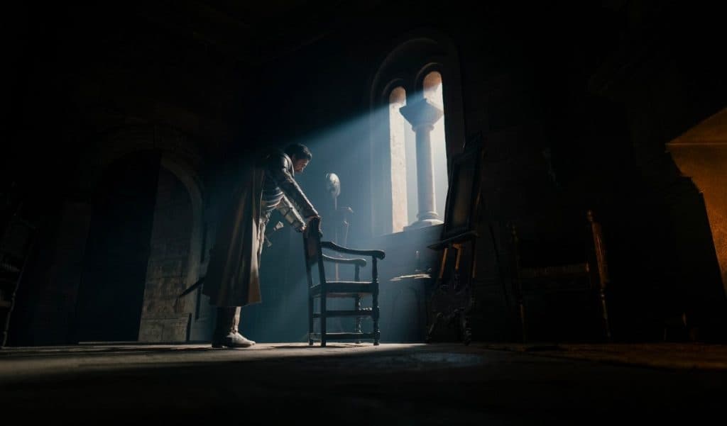 House of the Dragon Season 2 Episode 3: Fabien Frankel as Criston standing by the window