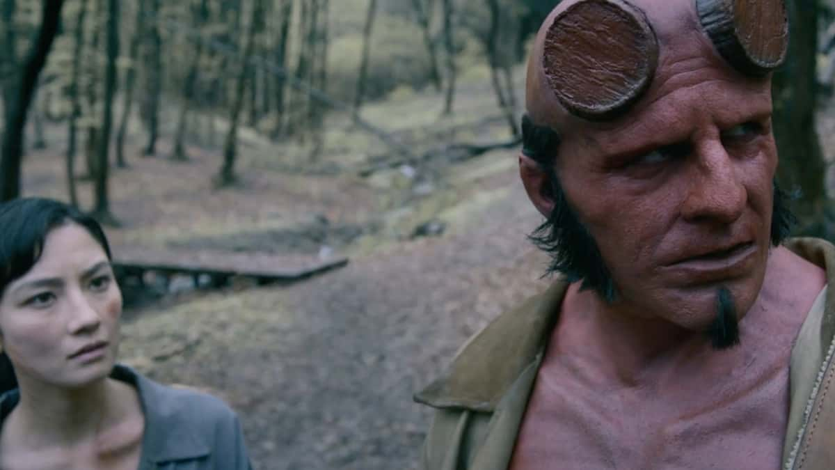 Jack Kesy and Adeline Rudolph in Hellboy: The Crooked Man