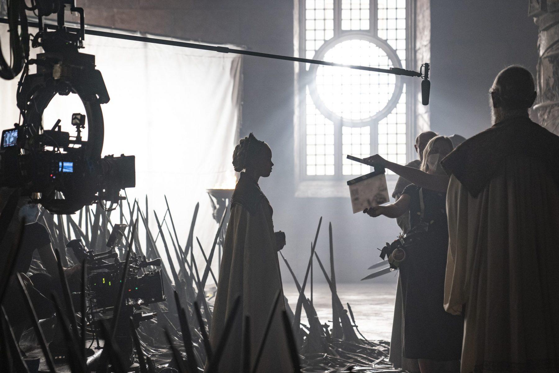 Milly Alcock filming in the Iron Throne Room in House of the Dragon Season 1.