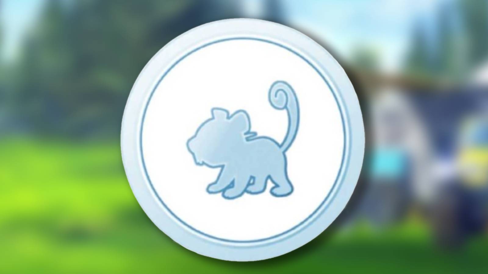 the rattata medla from POkemon Go is shown against a blurred background