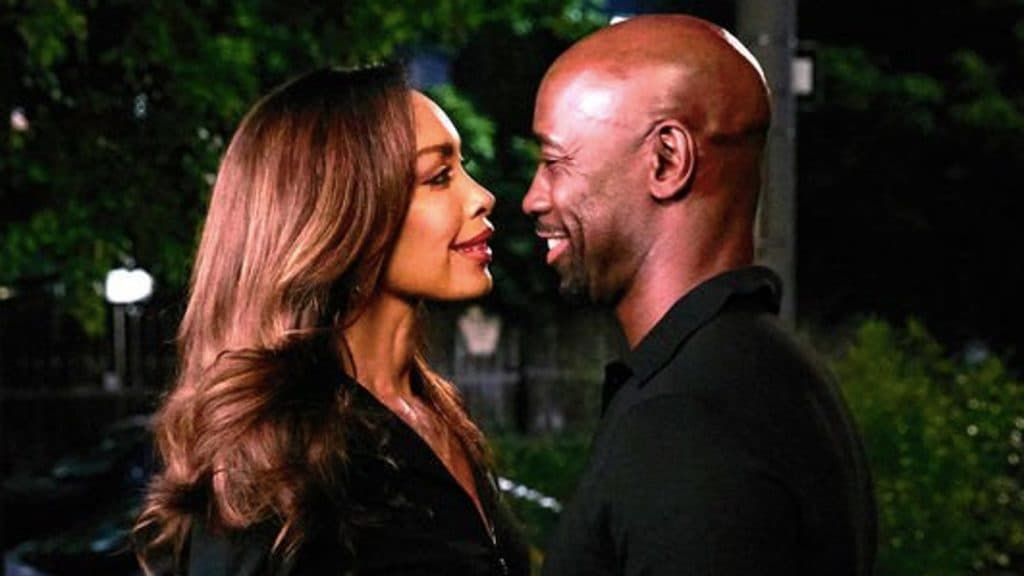 Gina Torres and DB Woodside in Suits