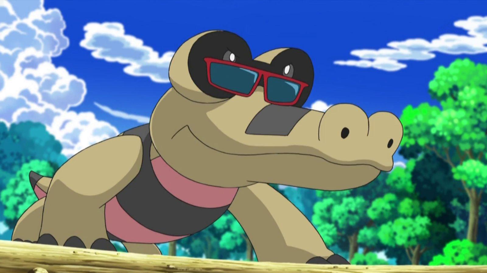 Sandile Pokemon wearing sunglasses from the anime.