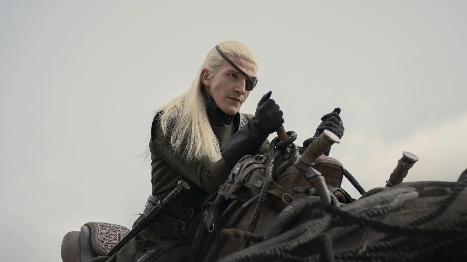 Ewan Mitchell as Aemond in House of the Dragon Season 2 Episode 4, sitting on his dragon