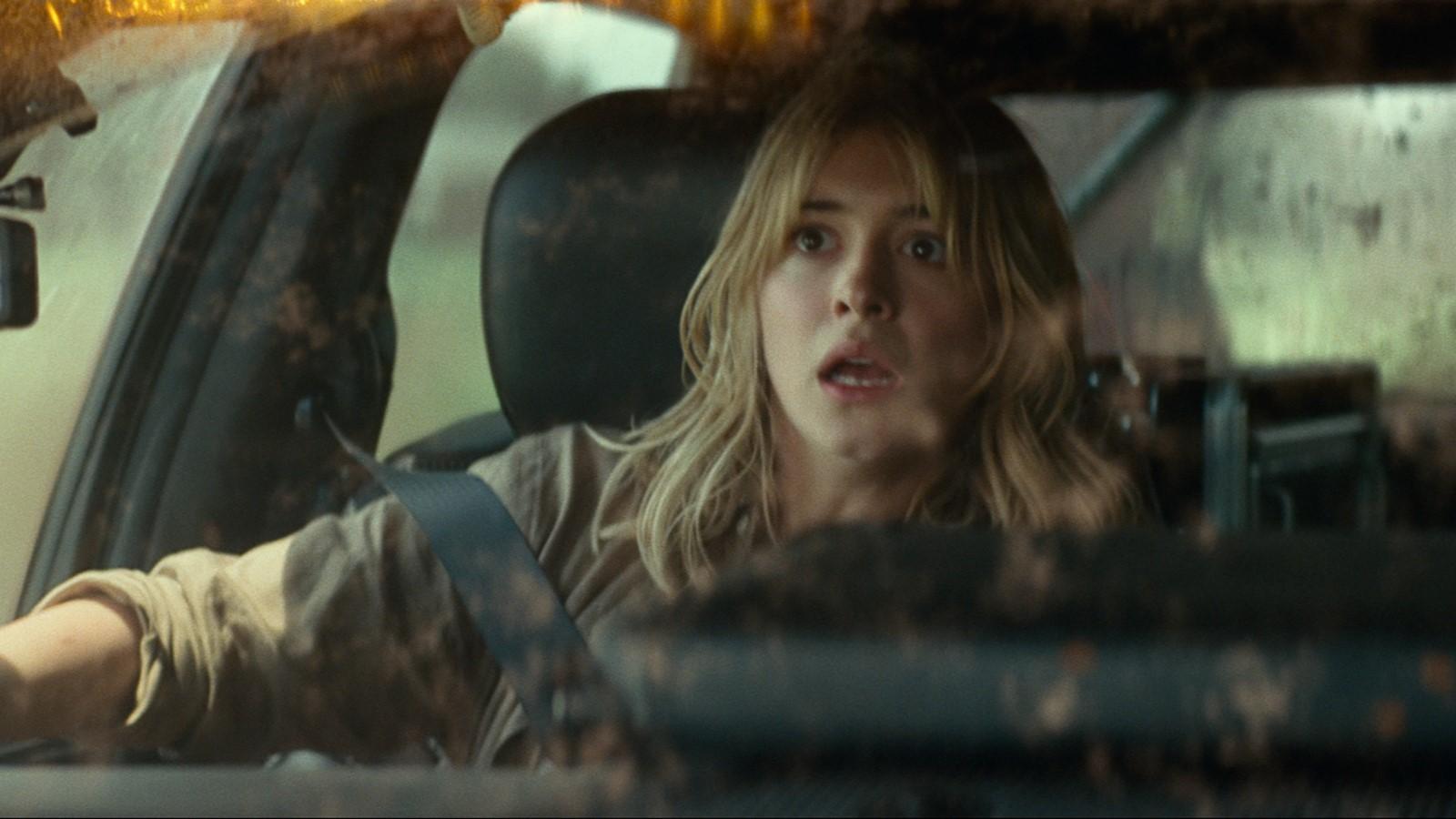 Twisters age rating: Daisy Edgar-Jones as Kate, sitting in a car and looking out the window