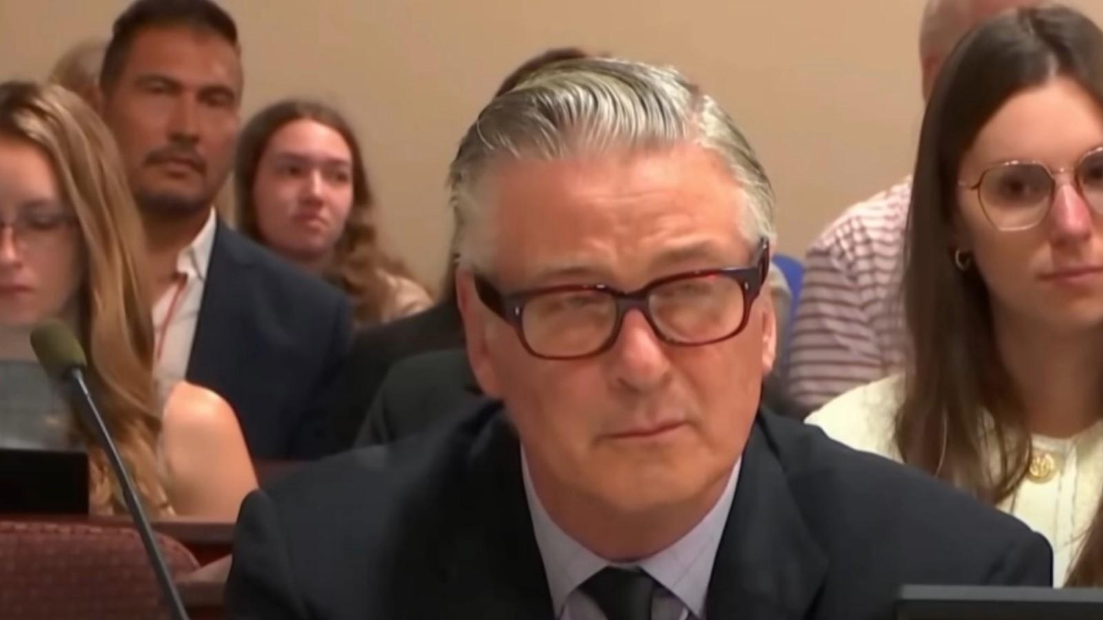 Alec Baldwin in court, finding out his Rust case has been dismissed over concealed evidence