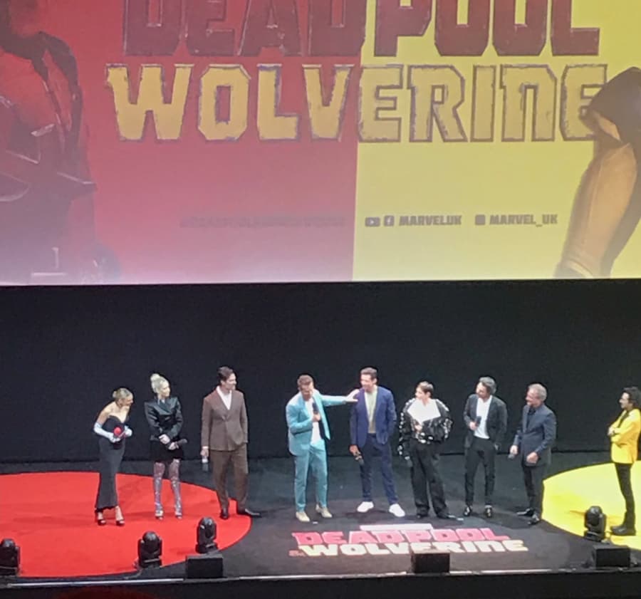 Ryan Reynolds and Hugh Jackman on stage at the Deadpool & Wolverine sneak peak event