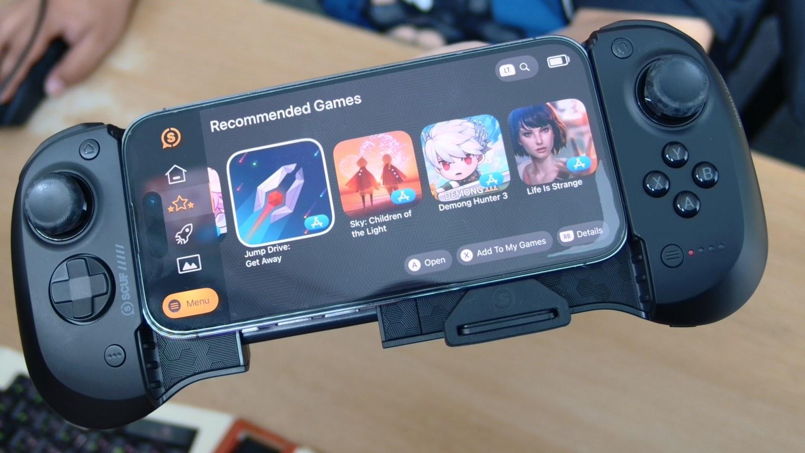 Scuf Nomad close up with games displayed on it on iPhone