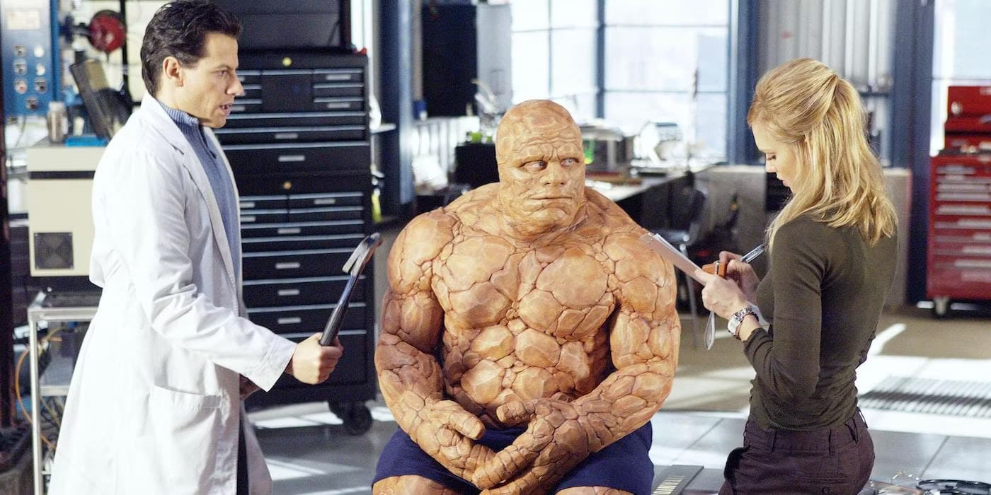 Ioan Gruffudd, Michael Chiklis, and Jessica Alba as Reed, Ben, and Sue in Fantastic Four (2005)