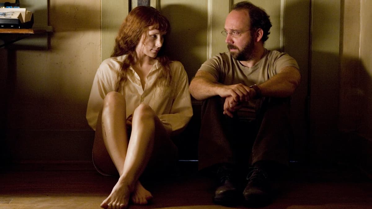 Dallas Bryce Howard and Paul Giamatti in Lady in the Water