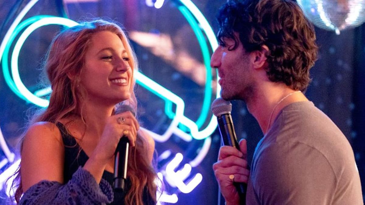 Lily and Ryle singing at karoke in It Ends with Us