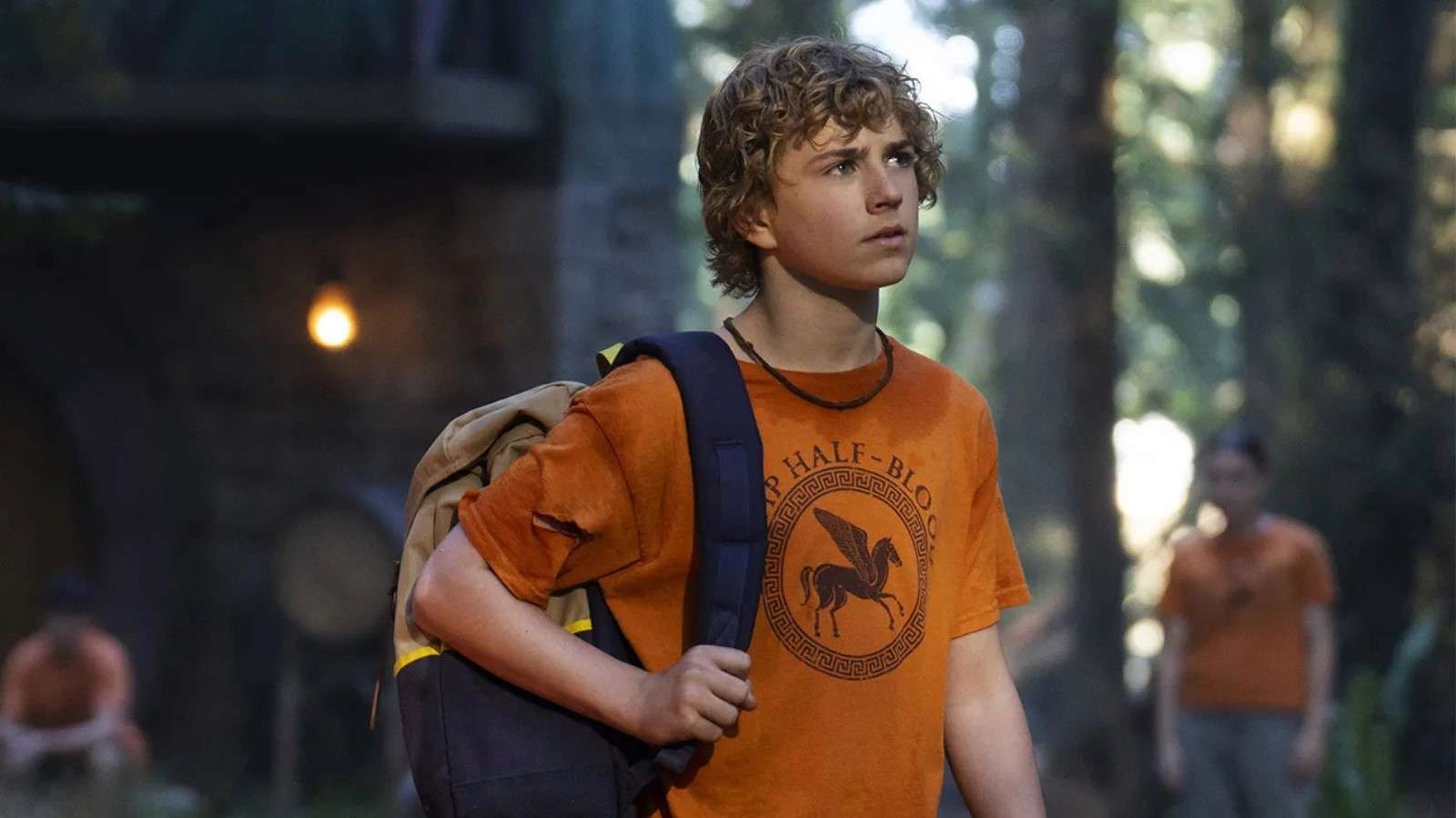 Walker Scobell as Percy Jackson, wearing a camp Half-Blood t-shirt