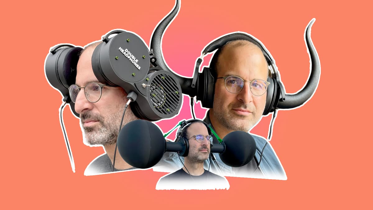 headphone maker Philip Kaplan with three pairs of his headphones on an orange background