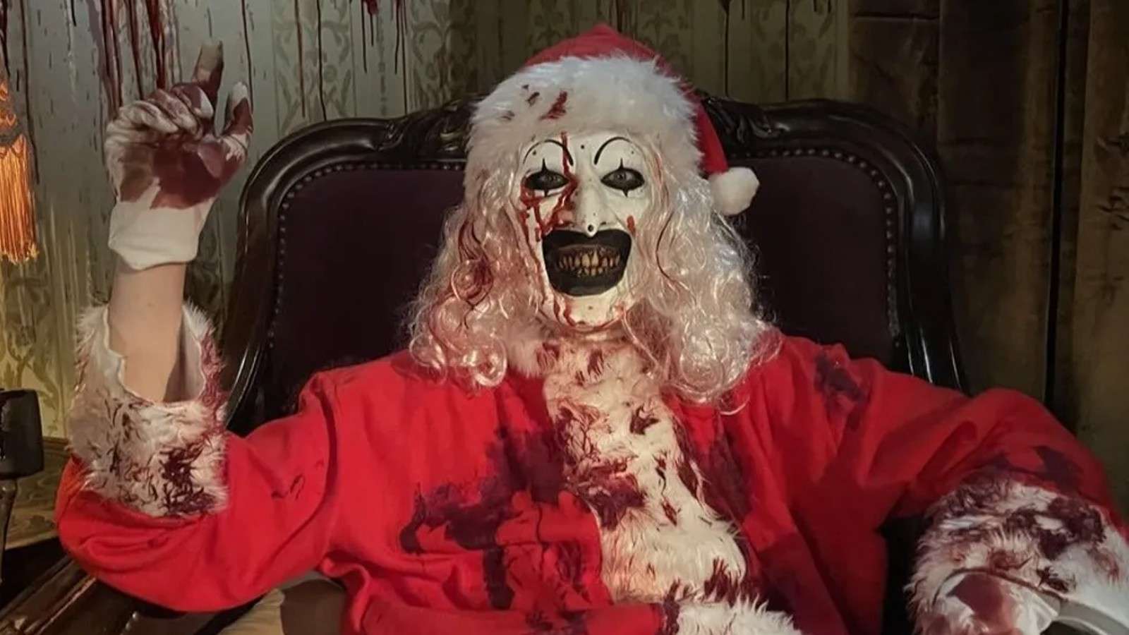 Art the Clown dressed as Santa in Terrifier 3.