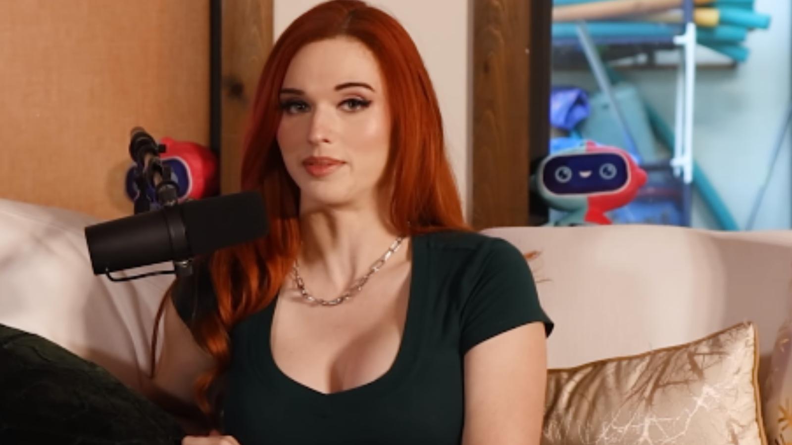 amouranth sitting on couch