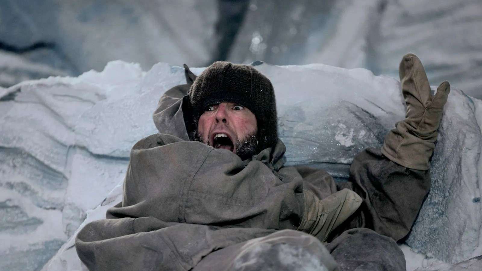 The Terror on Netflix: A man backs against a wall of ice, looking terrified