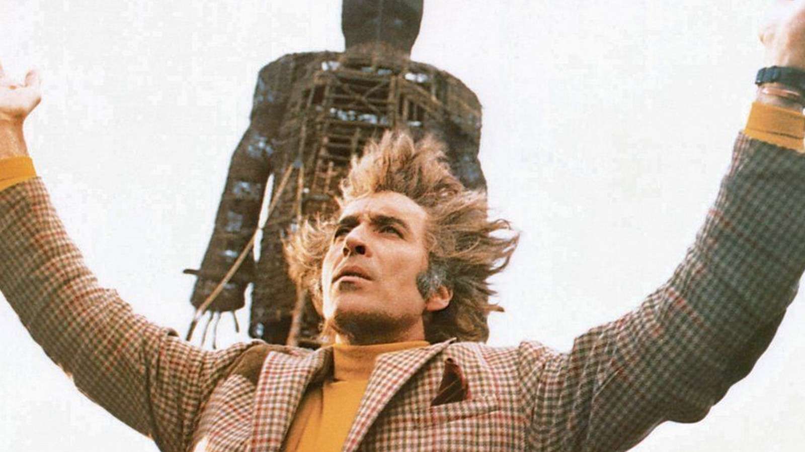 Christopher Lee in front of The Wicker Man.