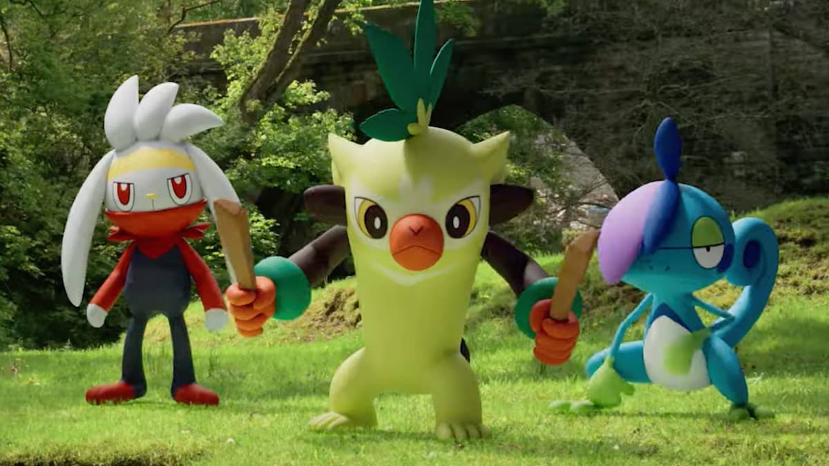 The Pokemon Raboot, Thwackey, and Drizzile stand in a clearing