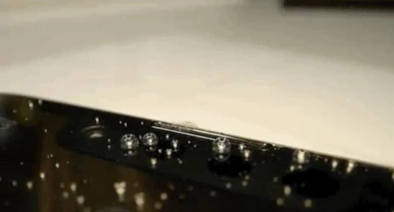 Water coming out of iPhone speakers.