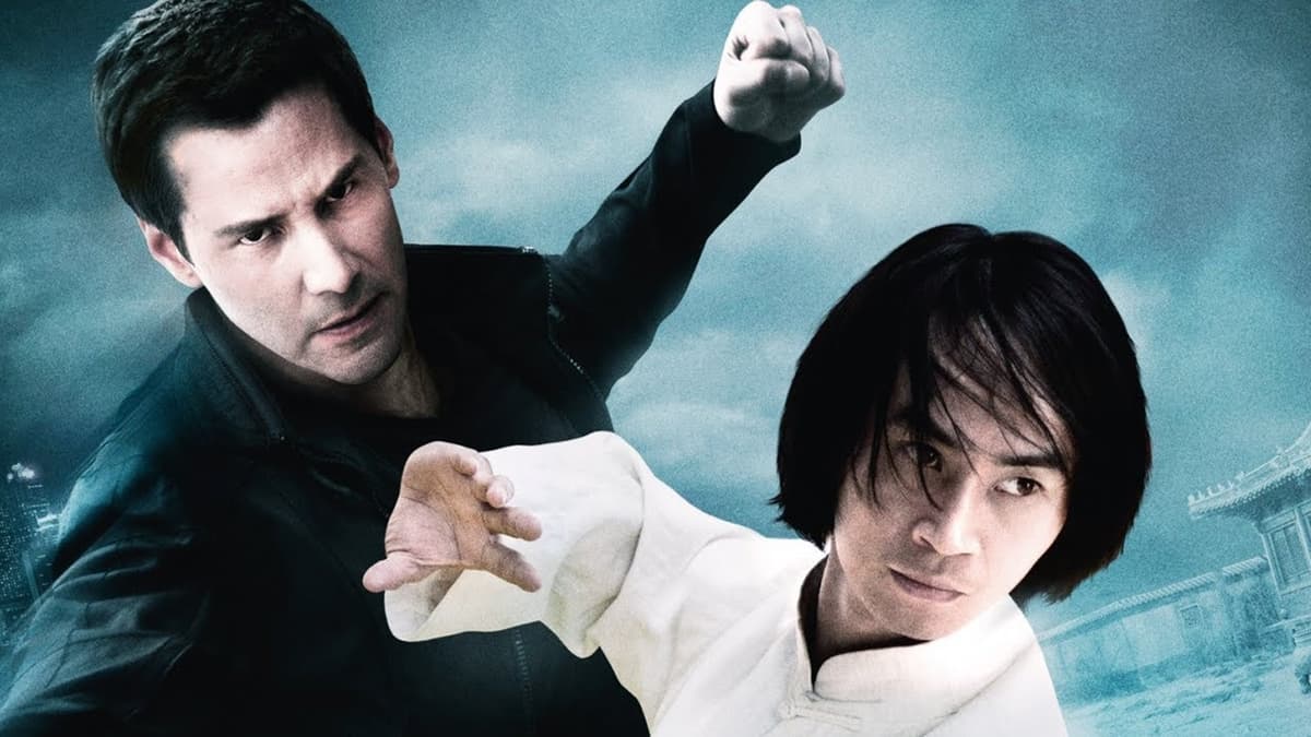 Keanu Reeves with his fists flying in Man of Tai Chi.