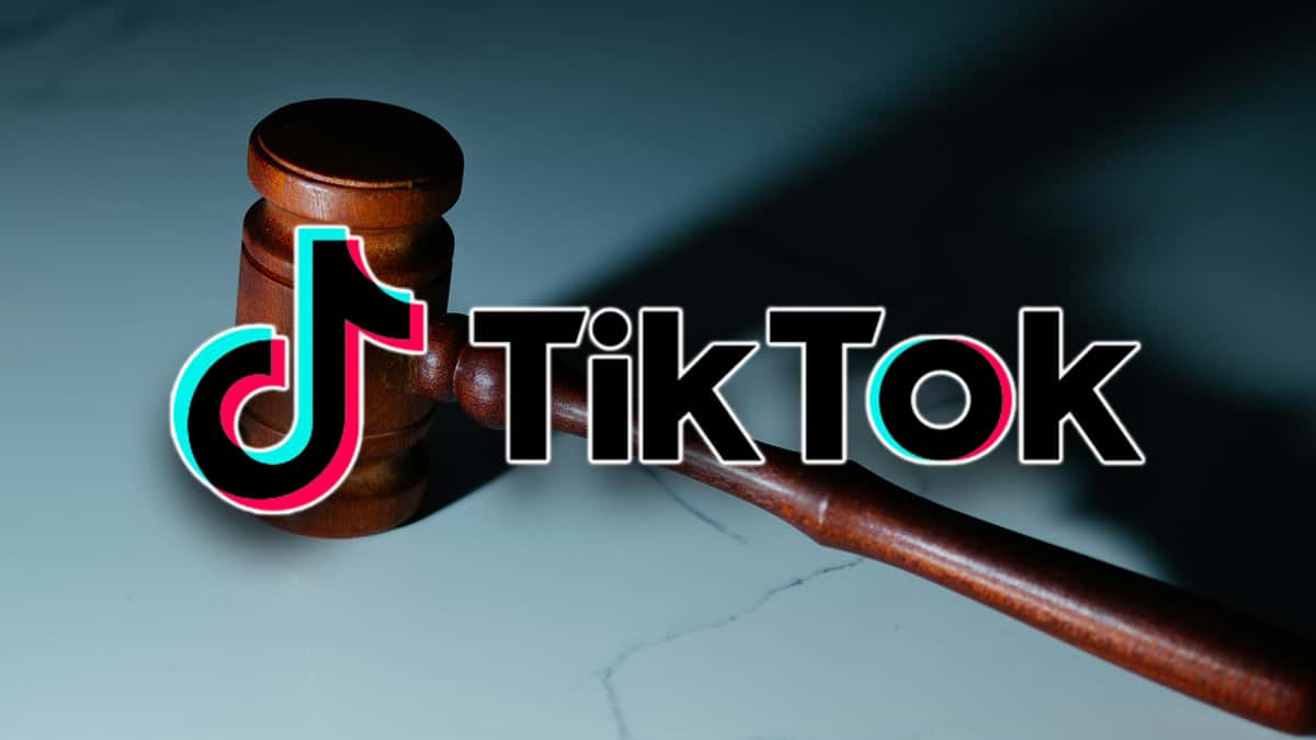 A gavel sits on a judge's bench with the TikTok logo overlaid on top.