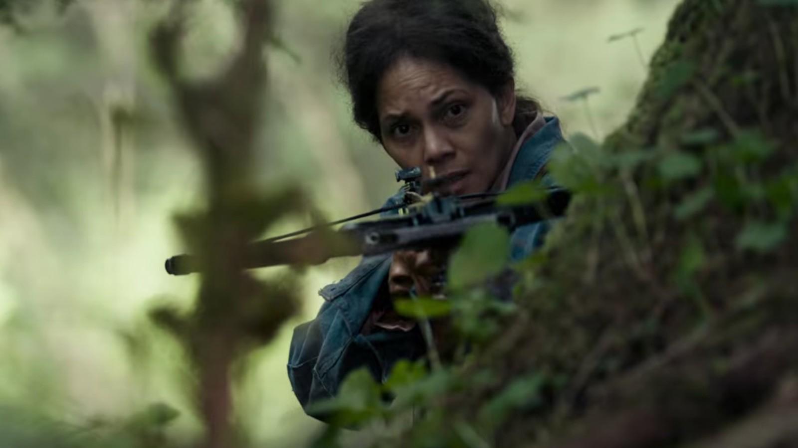 Halle Berry firing a crossbow in Never Let Go.