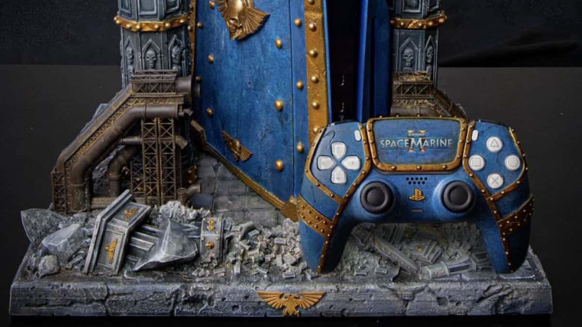 Close up of the Space Marine 2 custom PS5 and its DualSense controller.