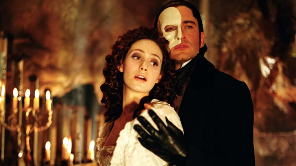 Gerard Butler as The Phantom and Emmy Rossum as Christine Daaé in The Phantom of the Opera