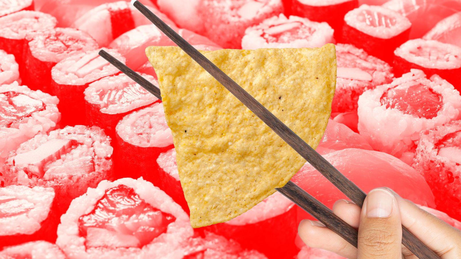 a tortilla chip being lifted with chopsticks with sushi in background