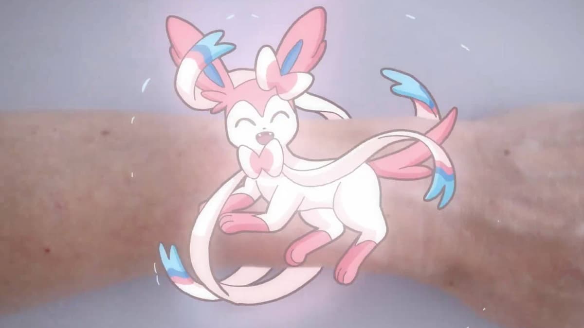 The Pokemon Sylveon appears on a person's wrist