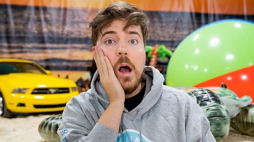 MrBeast wears a shocked facial expression.