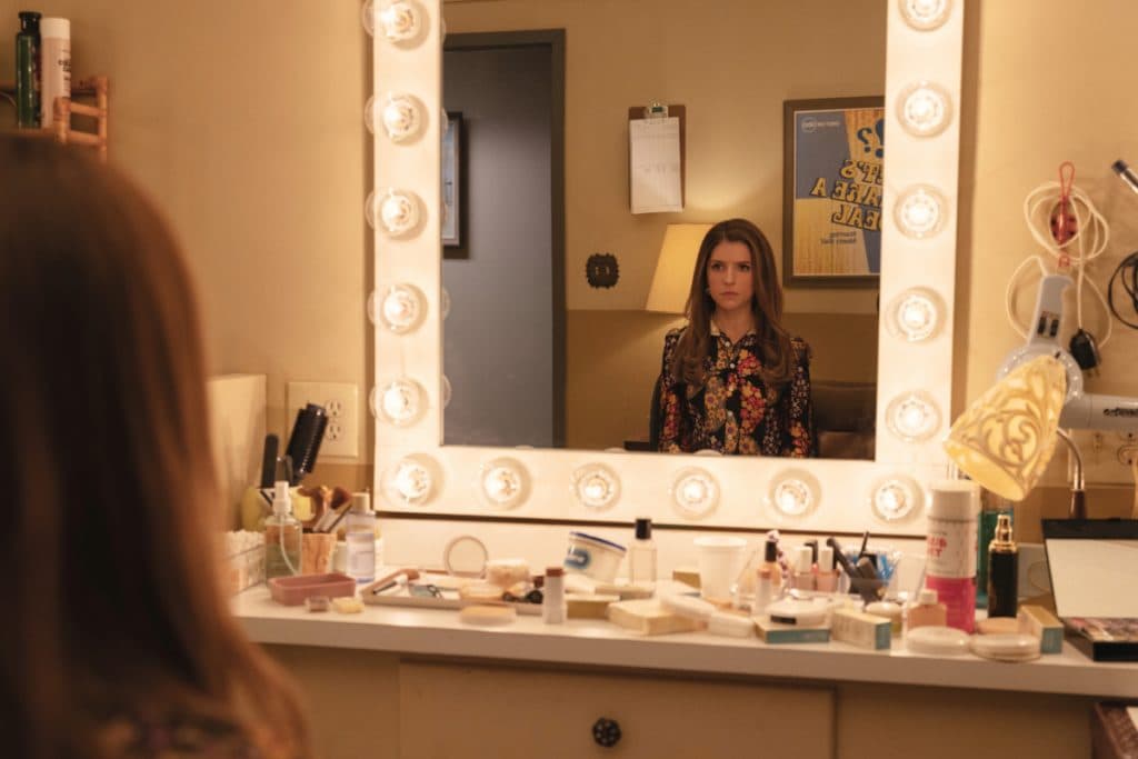 Anna Kendrick as Cheryl Bradshaw in Woman of the Hour, looking into a mirror