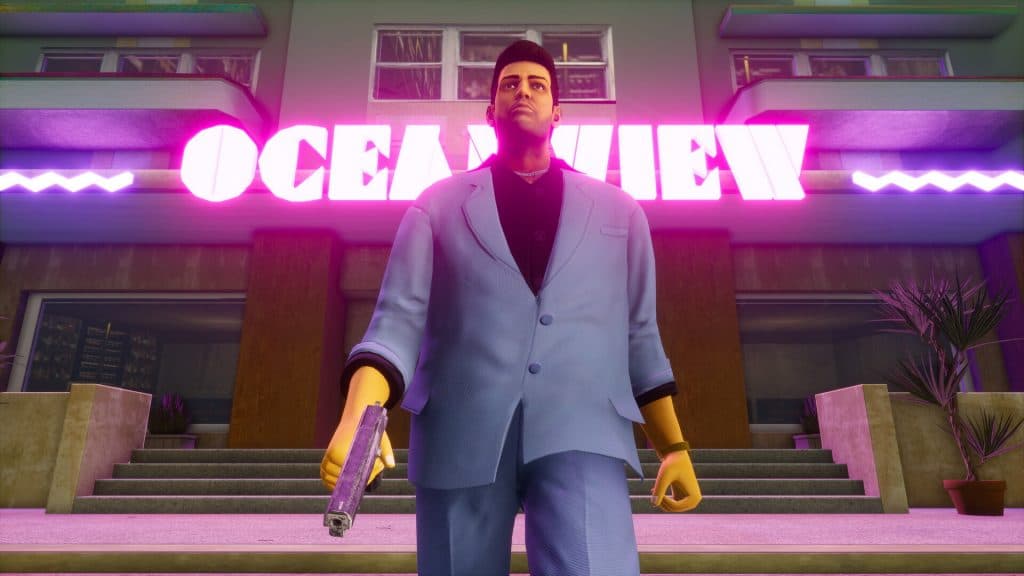 Tommy Vercetti wearing a blue suit, walking out of a hotel