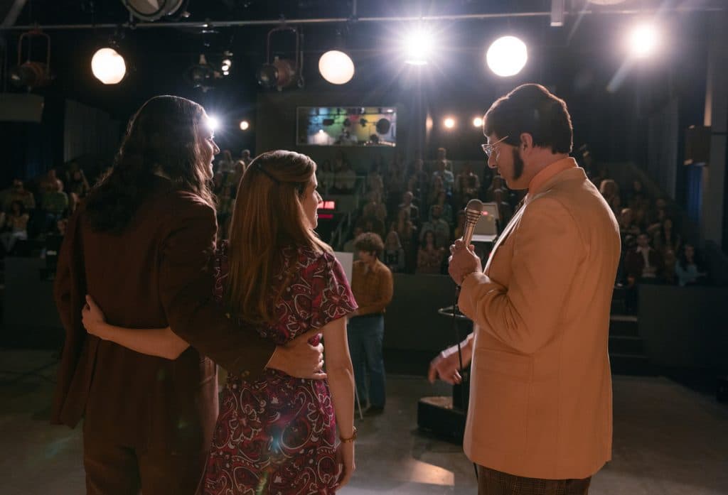 Woman of the Hour on Netflix: Cheryl and Rodney stand on stage in front of a crowd