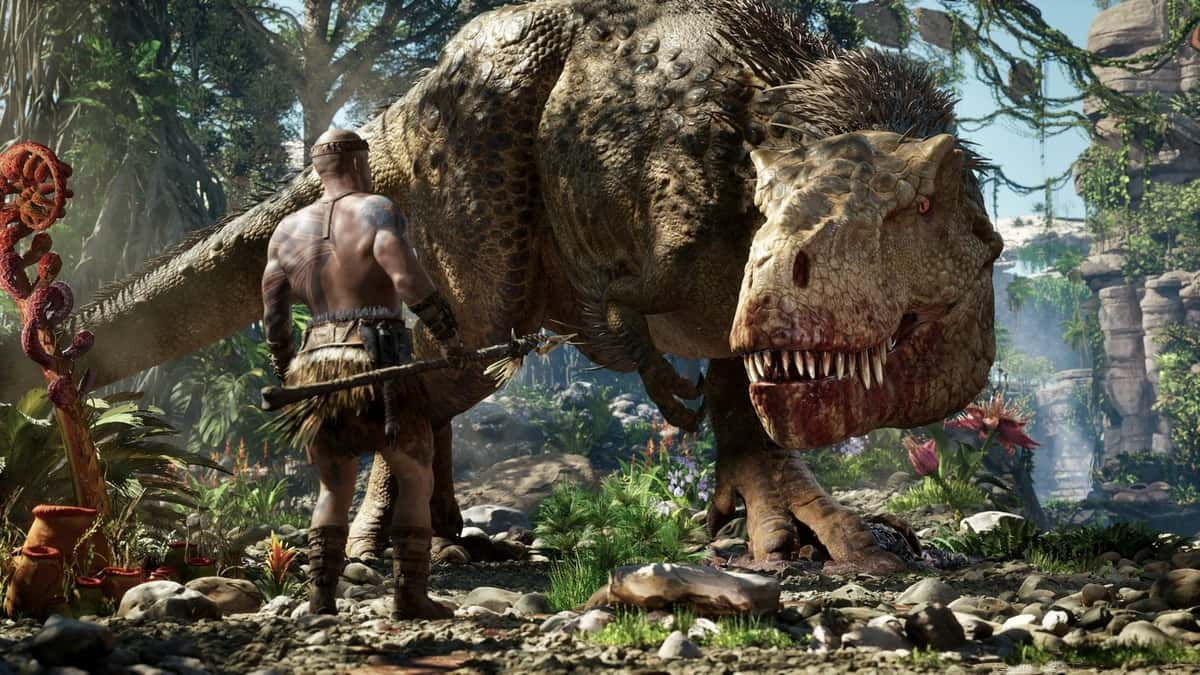 Vin Diesel, holding a spear, looking at a giant T-Rex.