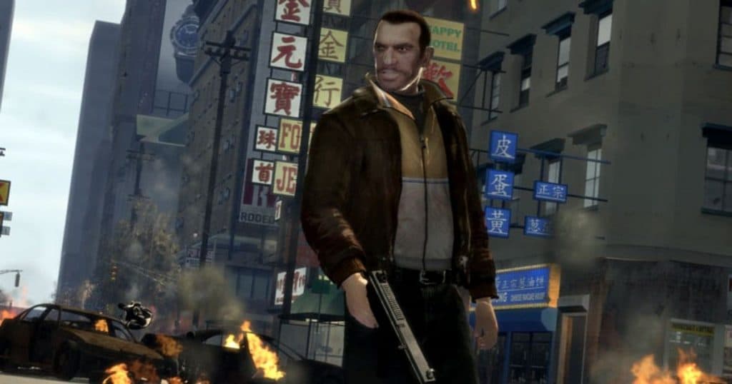 Niko standing on a street holding a weapon