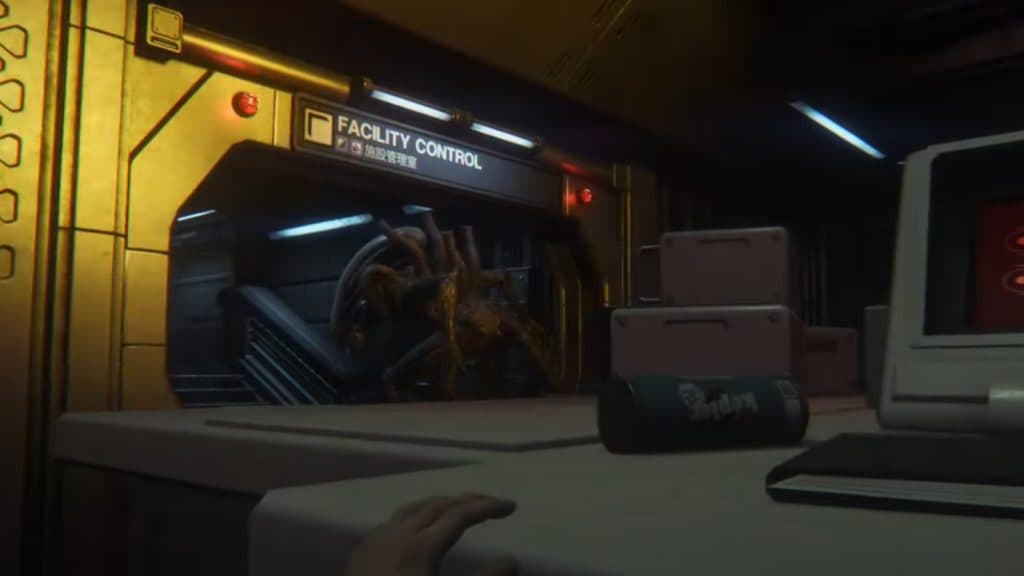 A Xenomorph slinks down a corridor ion Alien Isolation.