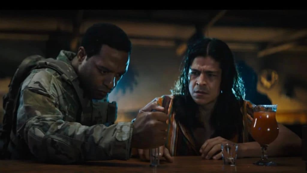 Chiwetel Ejiofor as Rex Strickland and Cristo Fernández as the Barman in Venom 3